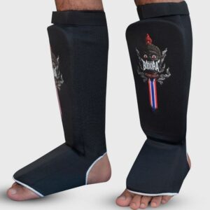 Espinilleras Tubular Buddha negras