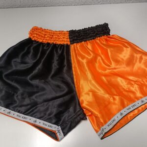 Pantalones Muay Thai Waikru Arlequin naranja